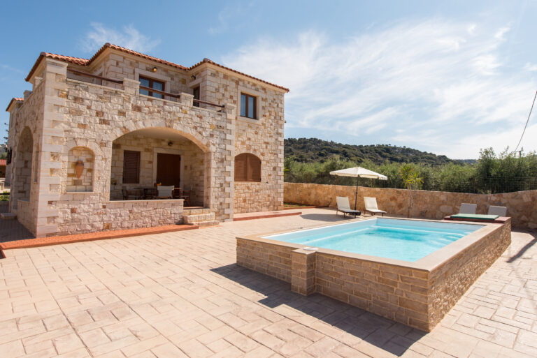 Stone built villa with swimming pool.